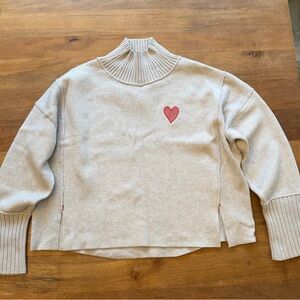Maeve Light Gray Turtleneck Sweater with embroidered Red Heart